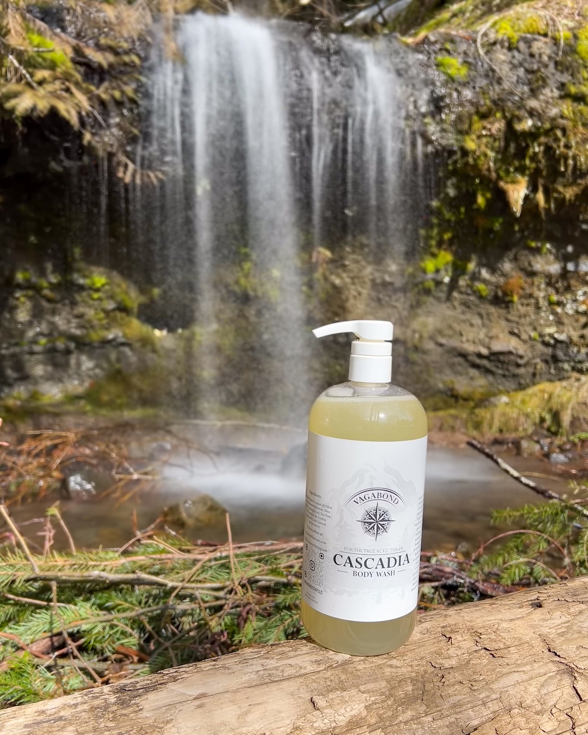 Cascadia natural body wash lemon citrus scent displayed against a long exposure waterfall backdrop.